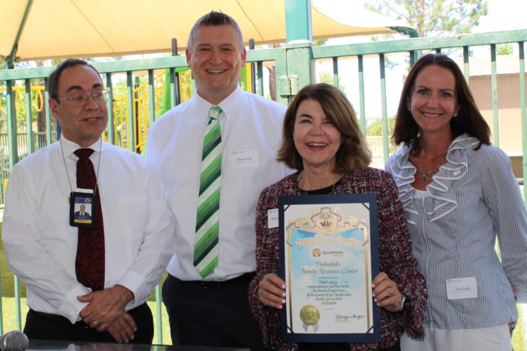 Charles Bostwick, from Supervisor Kathryn Barger’s Antelope Valley Field Office, with Sycamores’ Chad Scott, Debbie Manners, and Jana Lord.